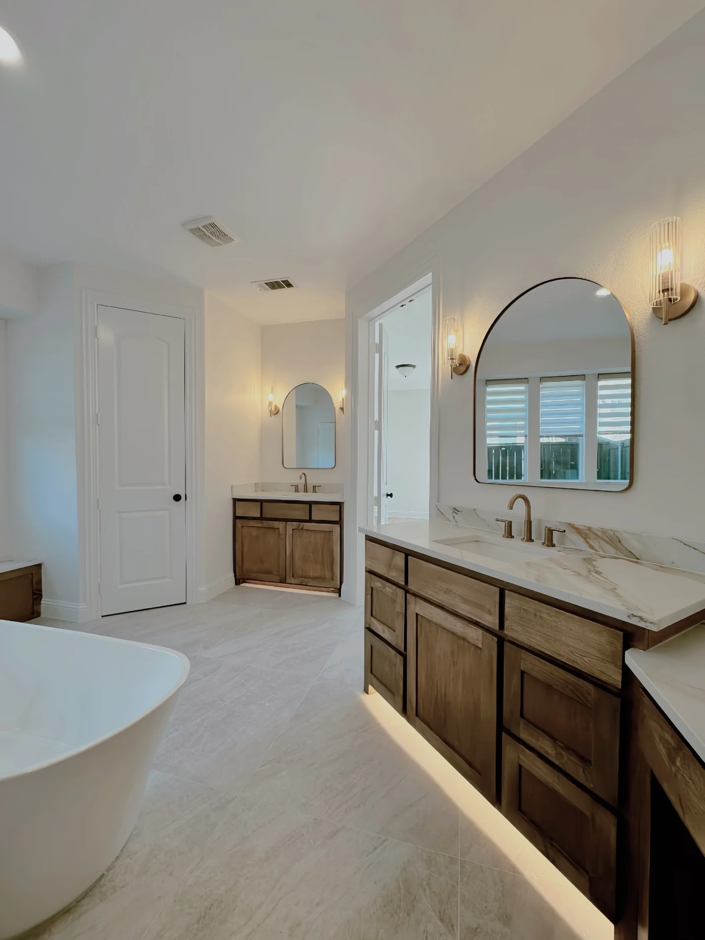 Custom vanities and freestanding tub